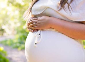 pregnant lady hands on belly