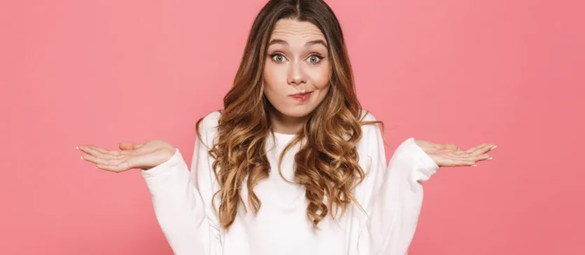 Woman Shrugging Shoulders